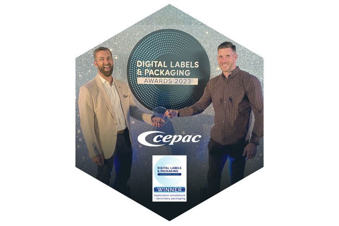 Image of Chris Fold and Martyn Kidner accepting an award trophy.